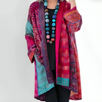 Multicolor knit cardigan with open front and long sleeves, pink and red patchwork