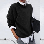 Soft crewneck pullover sweater in black, long sleeves.