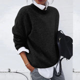 Soft crewneck pullover sweater in black, long sleeves.