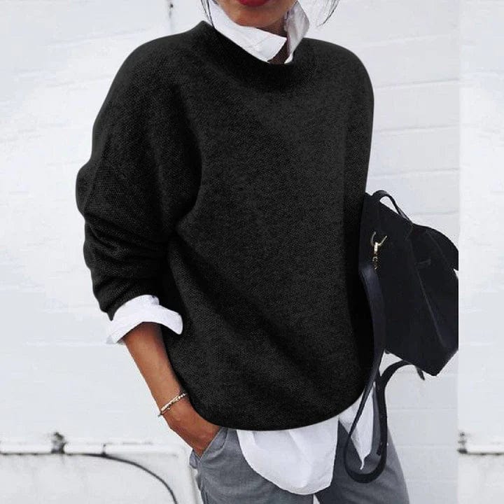 Soft crewneck pullover sweater in black, long sleeves.