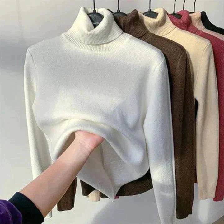 White fleece-lined turtleneck sweater, ribbed collar and long sleeves