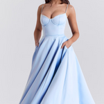Light blue corset bodice dress with thin straps and full flared midi skirt