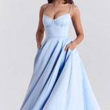 Light blue corset bodice dress with thin straps and full flared midi skirt