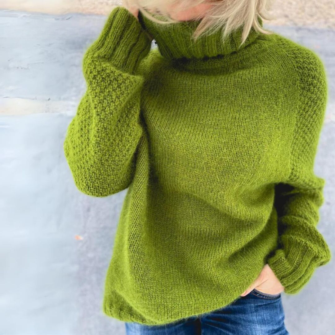 Green oversized rollneck sweater with high collar, long sleeves, ribbed cuffs