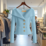 Light blue ribbed knit button-front top with long sleeves and peplum hem