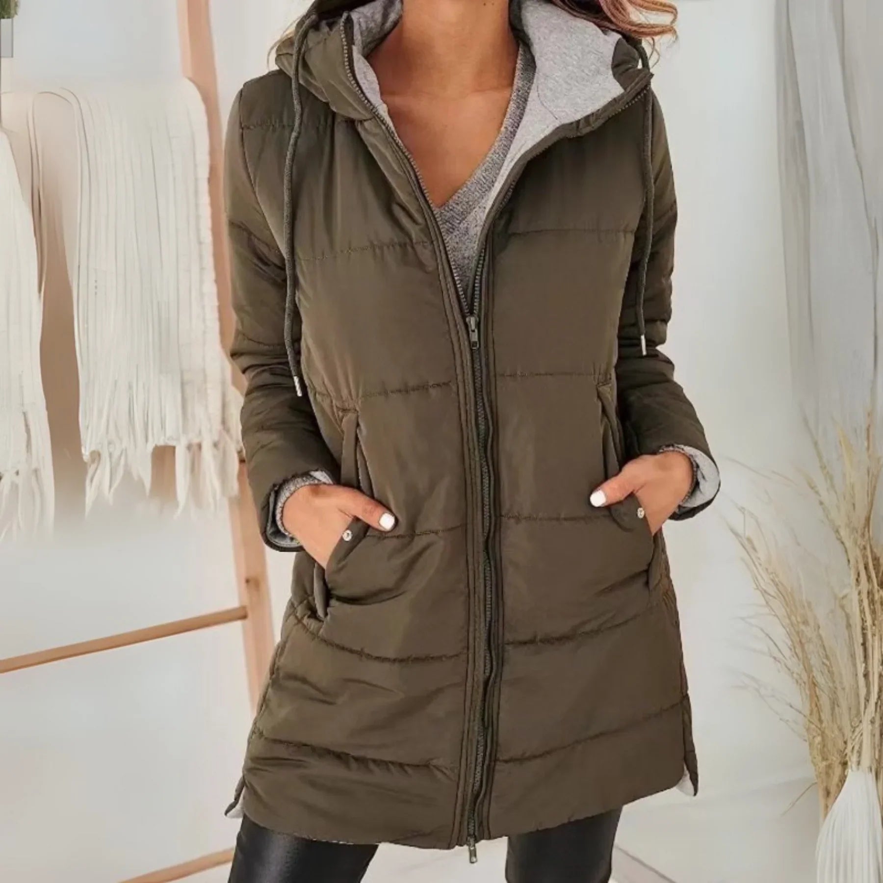 Olive green hooded puffer down jacket with front zipper and side pockets