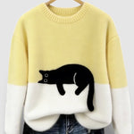 Yellow and white two-tone sweatshirt with black cat graphic on the front