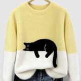 Yellow and white two-tone sweatshirt with black cat graphic on the front