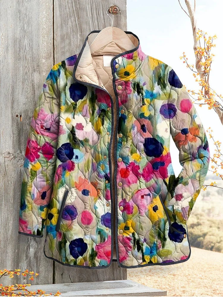 Women's vintage floral quilted jacket, multicolor with snap buttons and stand collar.