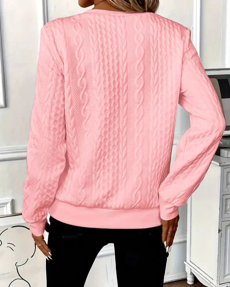 Women\u2019s back view half-zip cable-knit pullover sweater in pink, long sleeves