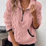 Pink fuzzy quarter-zip pullover with short sleeves and navy-trim accents