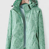 Green hooded jacket with front zipper and stand collar, leaf-patterned design