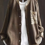 Dark brown knit cardigan, button front, ribbed trim, long sleeves, crocheted chest patch