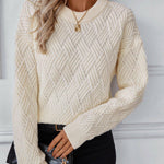Ivory chevron knit sweater with crew neck and ribbed cuffs