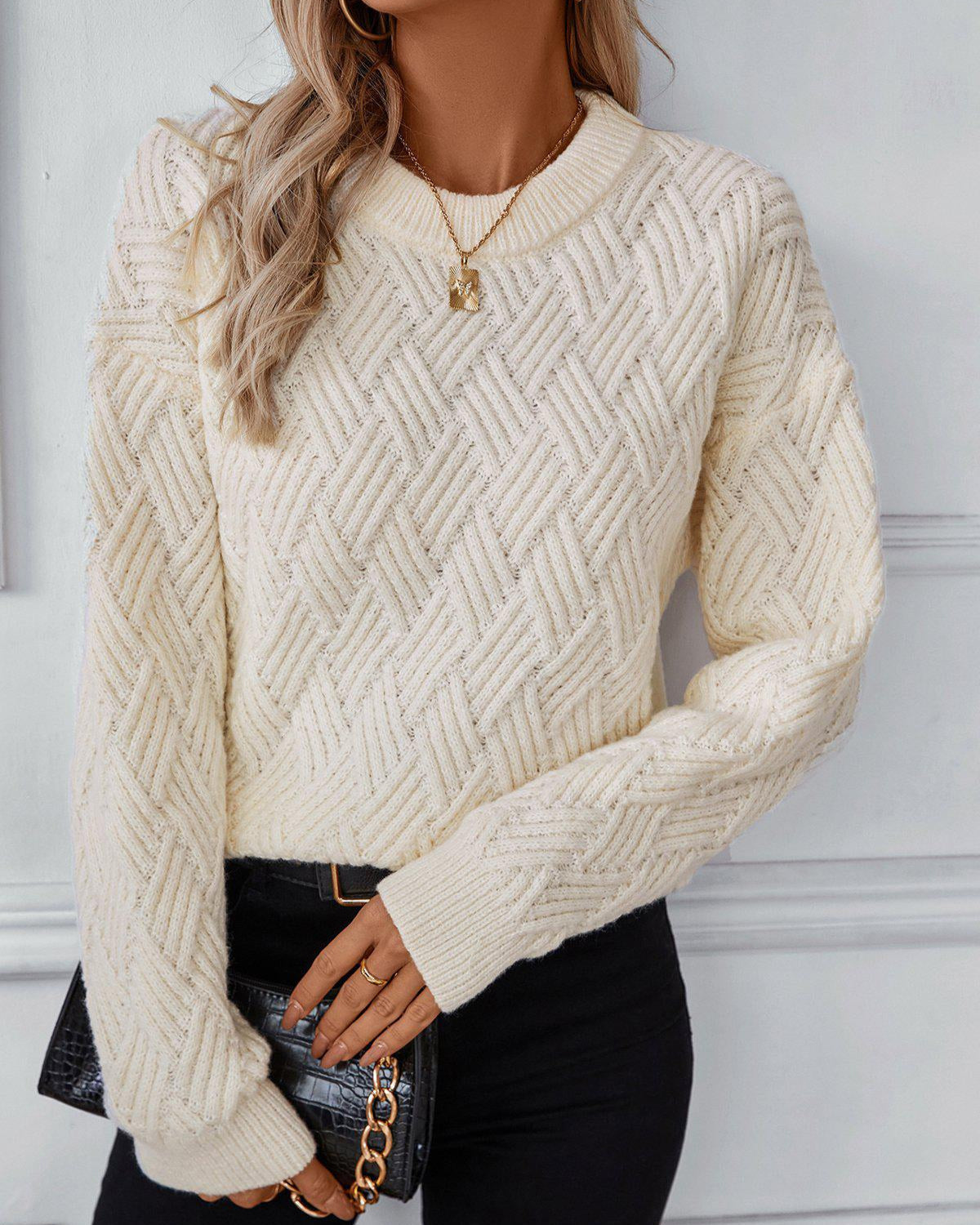 Ivory chevron knit sweater with crew neck and ribbed cuffs