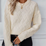 Ivory chevron knit sweater with crew neck and ribbed cuffs