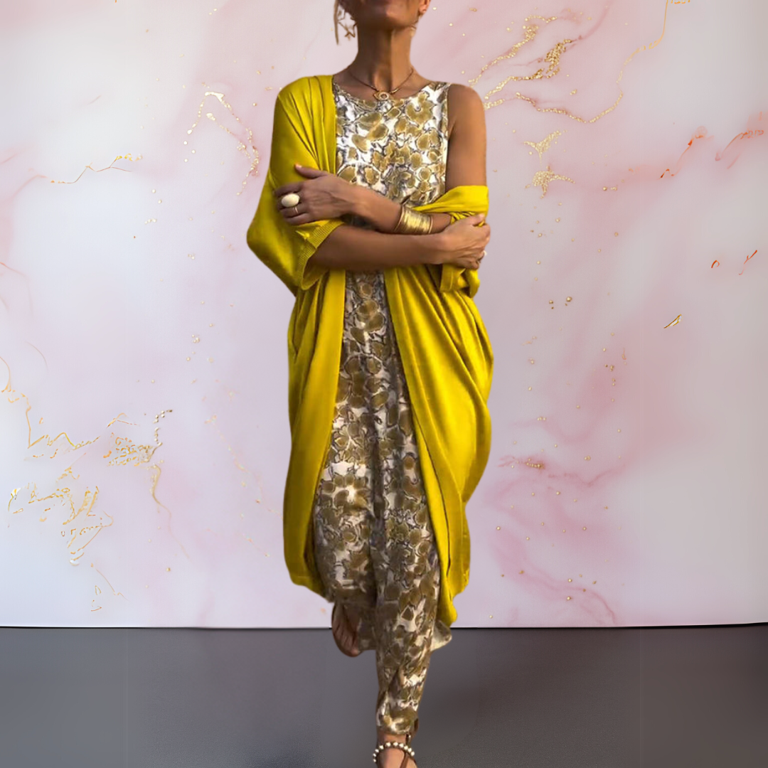 Animal-print sleeveless dress with yellow cardigan overlay, long fitted style