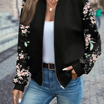 Black zip-front jacket with floral sleeves, stand collar and side pockets