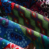 Remi™ patchwork jacket fabric close-up with colorful geometric tiles and stitching