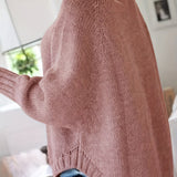 Dusty rose cable-knit vintage pullover with turtleneck, long sleeves, ribbed cuffs