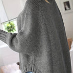 Gray cable-knit vintage pullover with turtleneck, long sleeves, ribbed cuffs