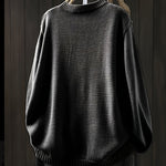 Black cardigan sweater with ribbed crew neckline, cuffs, and hem