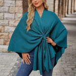 Teal draped poncho with V-neck and gathered front knot, wide cape sleeves
