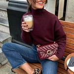 Burgundy ribbed knit turtleneck sweater with long sleeves
