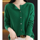 Green knit pullover with button-front V-neck and long sleeves