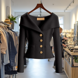 Black ribbed knit button-front top with long sleeves and peplum hem
