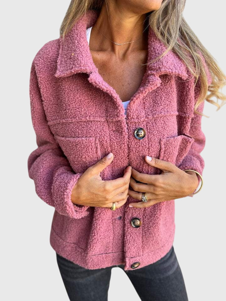 Pink sherpa jacket with button placket and flap pockets
