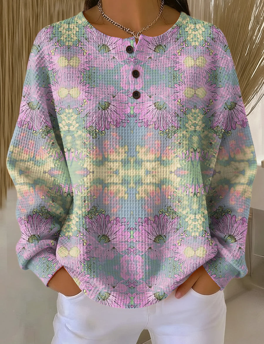 Ethnic floral pullover with long sleeves, light pink, and button placket