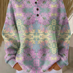 Ethnic floral pullover with long sleeves, light pink, and button placket