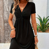 Black short-sleeve dress with twisted V-neck and gathered waist detail