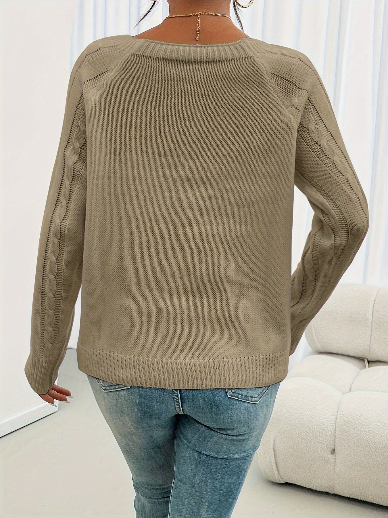 Khaki crewneck knit sweater, back view, with ribbed hem and long sleeves