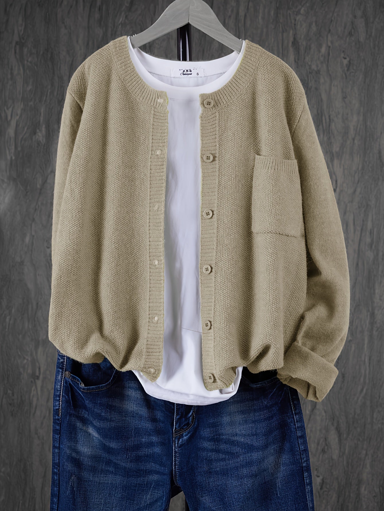Beige round-neck cardigan with button front and side pocket