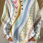Colorful patterned pullover sweater, long sleeves, button-front henley style