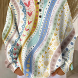 Colorful patterned pullover sweater, long sleeves, button-front henley style