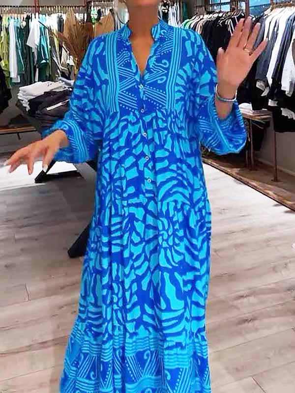 Blue printed V-neck midi dress with 3/4 sleeves and button front