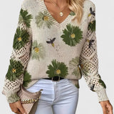 Relaxed floral pullover sweater, cream knit with green flower print, V-neck, long sleeves