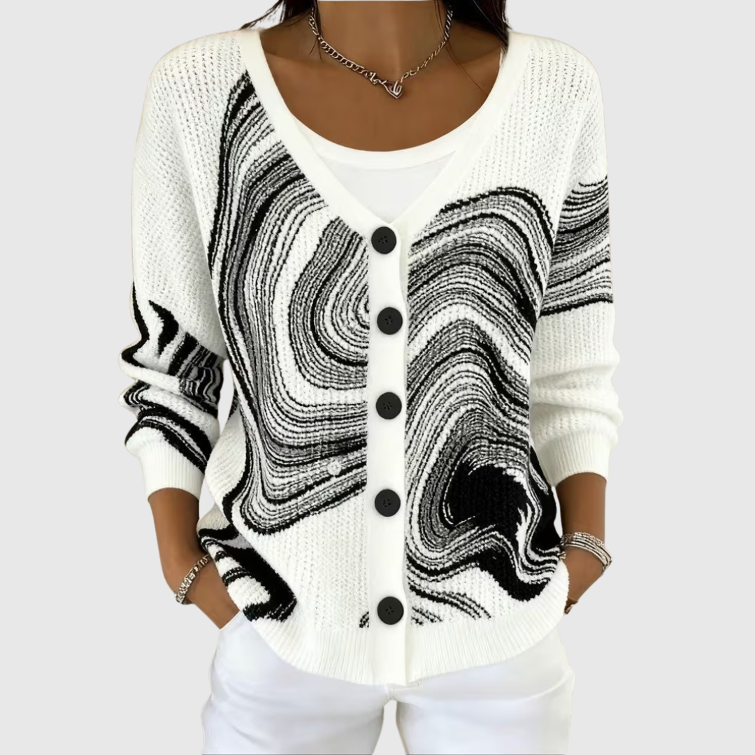 Womens knit cardigan with button front, white with black abstract swirl pattern, long sleeves