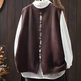 Coffee-brown sleeveless knit cardigan with vertical button placket and ribbed edges