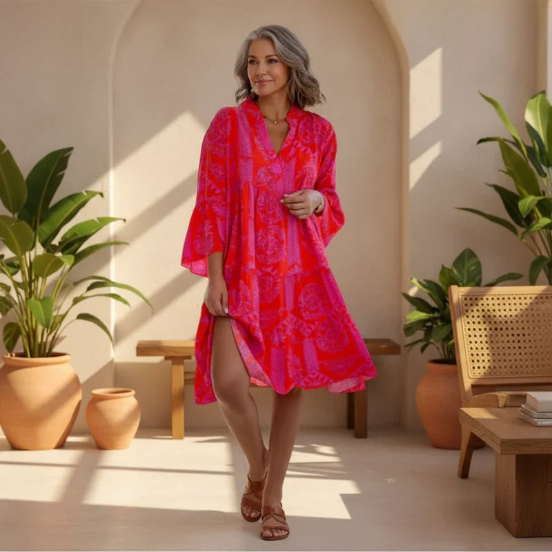 Red boho dress with 3/4 sleeves, V-neck, and tiered skirt