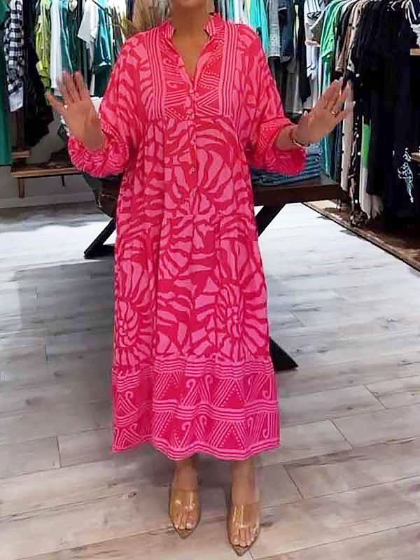 Pink printed V-neck midi dress with 3/4 sleeves and button front