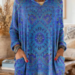 Vintage-inspired hooded knit tunic with front pockets, blue multicolor ethnic print