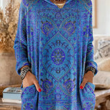 Vintage-inspired hooded knit tunic with front pockets, blue multicolor ethnic print