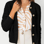 Womens knit cardigan with button front, black textured knit and long sleeves