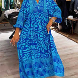 Blue printed V-neck midi dress, side view, 3/4 sleeves and button front