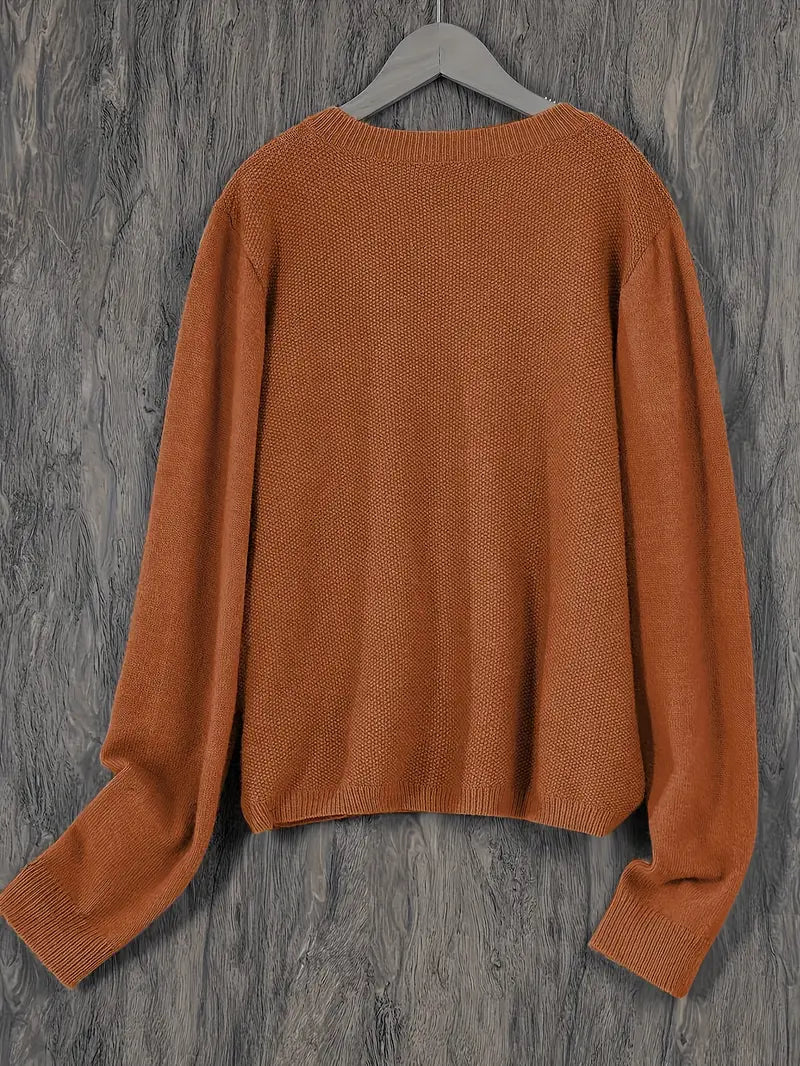 Women’s round-neck cardigan with long sleeves, rust brown knit texture, cropped back view