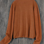 Women’s round-neck cardigan with long sleeves, rust brown knit texture, cropped back view